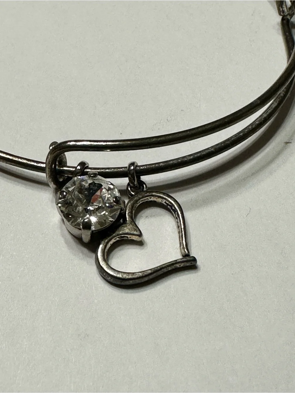 Silver-Tone Heart Charm Bangle with Clear Crystal